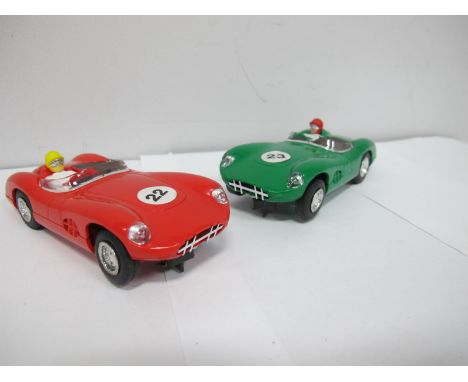 Two Modern Hornby Hobbies Scalextric Cars, both Aston Martin Racers, one red, one green, very good, unboxed. 