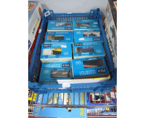 Fifteen Peco "OO" Gauge Goods Wagons Made Up, including ESSO tanker, Bass, Portland cement, Kingsbury Collieries open wagon. 