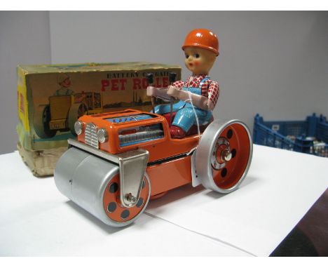 A Battery Operated Tinplate "Pet Roller" by Daiya of Japan. Orange/silver. No battery box corrosion. Boxed. 