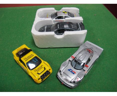 Four Hornby/Scalextric Cars, including Ford RS 200, Mercedes CLK LM, Ford Taurus Twin Set. All Playworn.