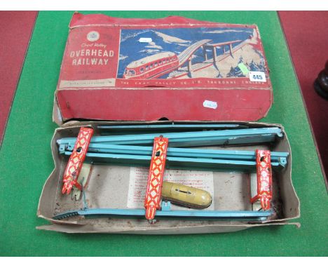 A Mid XX Century Tinplate Clockwork Overhead Railway by Chad Valley, signs of some rusting. Box. Box poor. 