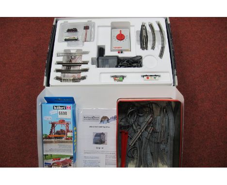 A Marklin Z Gauge Train Set No. 81521. Comprising 0-6-0 locomotive, three wagons, track, etc. Appears little used. Boxed; tog