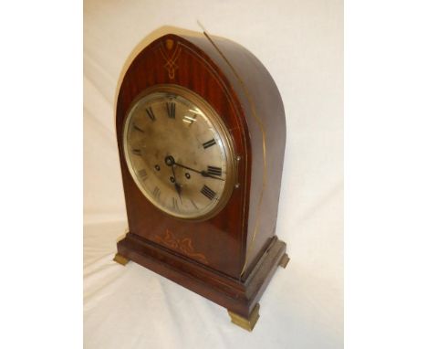 A good quality German bracket clock with silvered circular dial in inlaid mahogany Gothic arched case with brass mounts 17" h