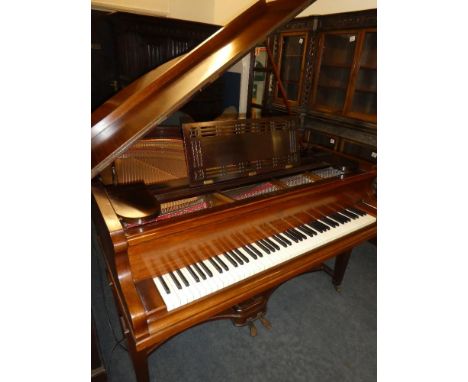 A good quality baby grand piano by R Gors &amp; Kallmann of Berlin in polished rosewood case - movement restored, legs requir