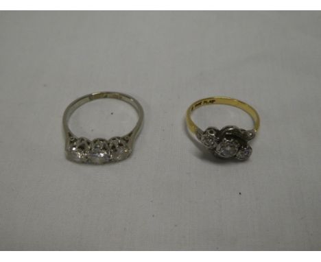 An 18ct gold engagement ring set three diamonds and one other good quality dress ring (2)