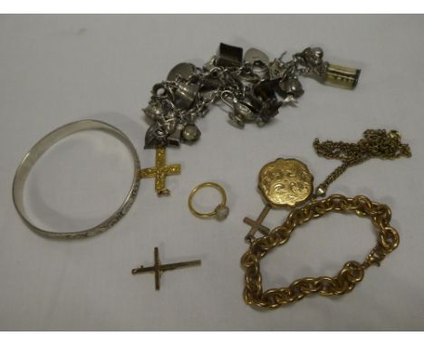 A selection of various costume jewellery including two crucifix pendants, silver charm bracelet, bangle, etc