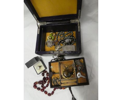 A jewellery box containing a quantity of various costume jewellery including moss agate brooch, silver signet ring, necklaces