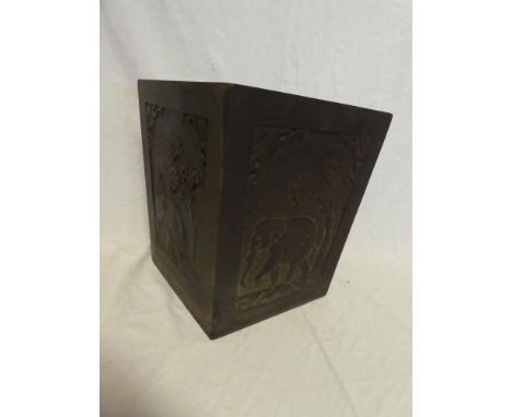 An Indian carved teak square planter with elephant decoration