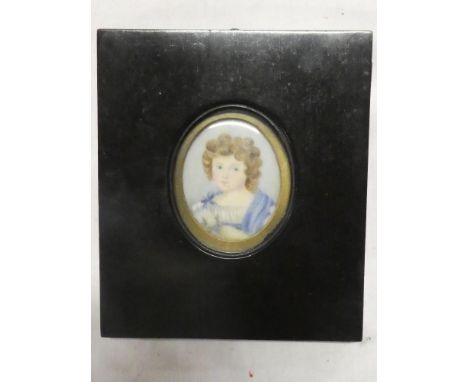 A 19th Century miniature watercolour on ivory depicting a bust portrait of a young girl "Amelia Bulteel" 2" x 1½" oval in ebo