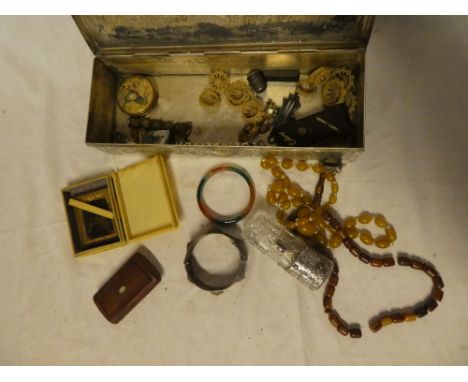 A silver plated table box containing a selection of various costume jewellery, silver mounted scent atomiser, snuff box, earl