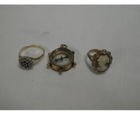 A 9ct gold dress ring set sapphires and diamond chips; 9ct gold dress ring set oval cameo portrait and a 9ct gold mounted com