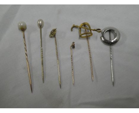 A 15ct gold stick pin set a small diamond and various other stick pins, etc