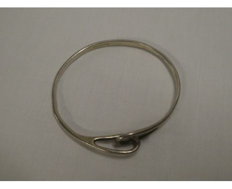 A Tiffany silver oval sprung heart bangle 