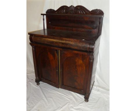 A mid-19th Century mahogany chiffonier with a single drawer in the frieze above a cupboard enclosed by two panelled doors, th