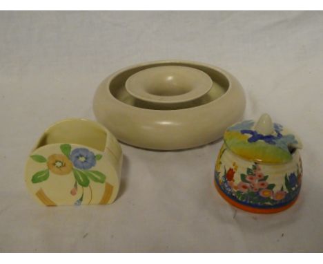 A Clarice Cliff "Chloris" preserve jar with non matching lid; Clarice Cliff Newport pottery arched sugar bowl with floral dec