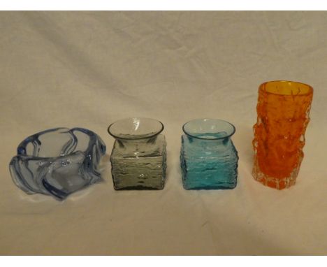 A Whitefriars blue tinted glass circular bowl made for Parker Pens; two Whitefriars tinted glass square vases and a cylindric