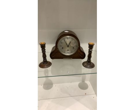 Westminister chimes mantel clock with haller ingraving to rear and candel sticks 