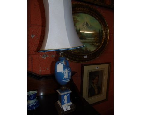 A Pale Blue Jasperware and Metal Mounted Table Lamp with shade.