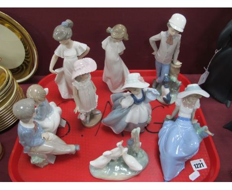 Eight Nao Pottery Figurines.