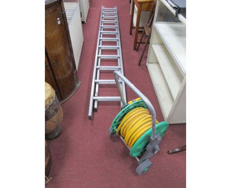 Garden Hose on Stand; aluminium ladder. (2)