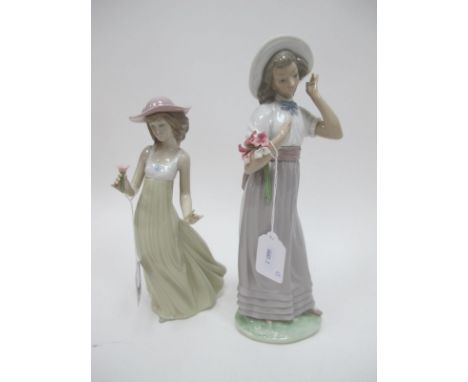 Nao Figure of a Girl Holding a Bouquet of Flowers; together with a further Nao figure similar. (2)