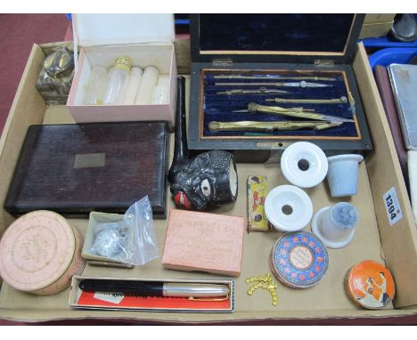 Geometry Sets, Waterman's pen, pottery inkwells, glass example, novelty pipe, rouge and cosmetics, ETC.