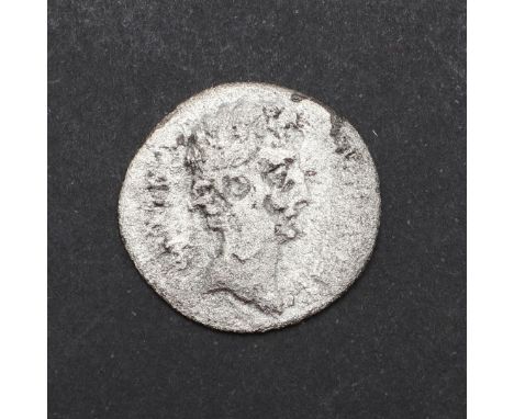 A silver denarius, obverse with laureate bust r. Reverse DIVVS IVLIVS' divided by an eight rayed comet. 2.64g. The comet repr