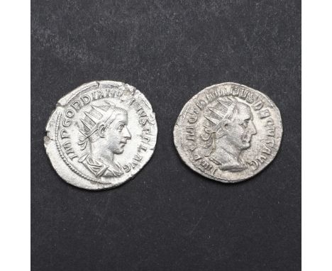 A silver antoninians, obverse with radiate bust r. Reverse with Gordian standing in military dress holding a globe and transv