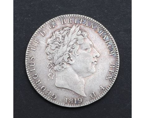 A George III Crown, laureate head r. dated 1819, St George and the Dragon to the Reverse. LIX to the rim. *CR A nice example 