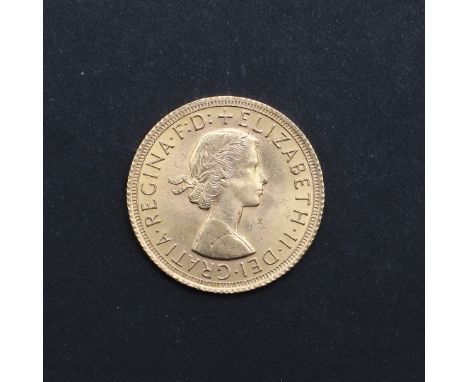 An Elizabeth II Sovereign, bare head r. reverse George and the dragon, dated 1966. *CR Light surface marks only. A nice examp
