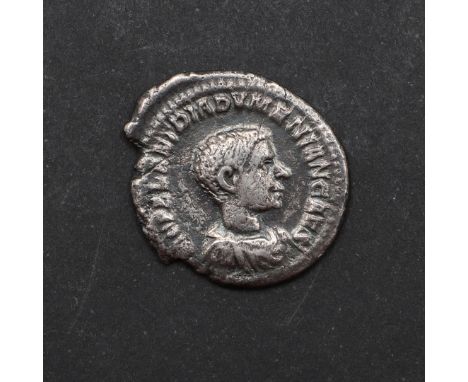 A silver denarius, obverse with bare headed bust r. Reverse with standing figure l. holding a standards and with two further 