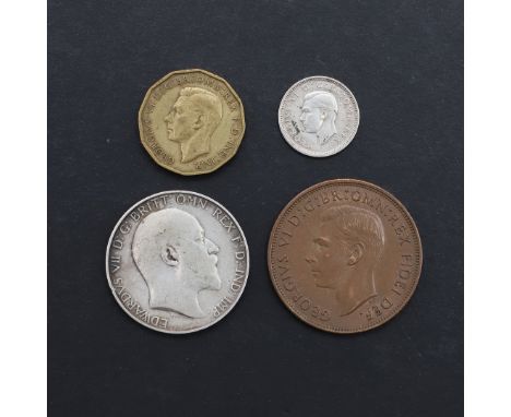 An Edward VII Florin, bare head portrait r. reverse standing figure of Britannia, dated 1905. A Threepence for 1944, a threep