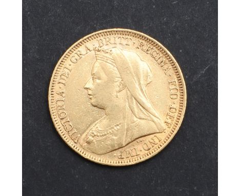 A Queen Victoria Sovereign, old veiled bust l. reverse with George and the dragon with 's ' to the ground for the Sydney Mint