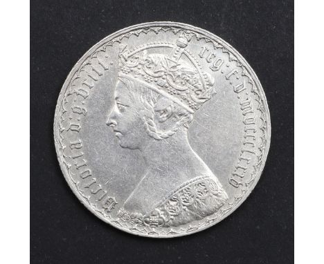 A Queen Victoria Florin, crowned gothic bust l. reverse with crowned shields, dated 1885. *CR A nice example with only very l