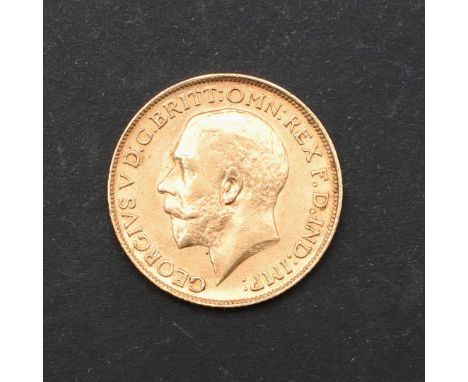 A George V Sovereign, bare head l. revers St George and the Dragon, dated 1911. *CR Light rubbing to surfaces.