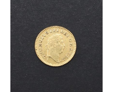 A George III Third Guinea, first laureate head r. first reverse, dated 1798. c.2.77g. *CR A nice crisp example with very ligh