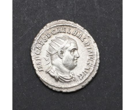 A silver antoninianus, obverse with radiate bust r. Reverse with clasped hands. 4.03g. *CR A very nice example from this shor