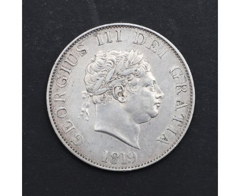 A George III Halfcrown, small laureate head r. dated 1819, reverse with crowned garter and shield. *CR Light surface marks, a