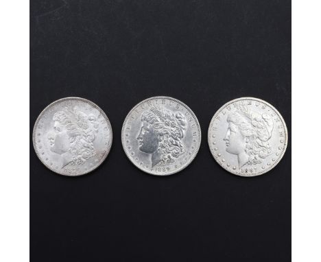 Three United States of America Morgan Dollars, 1879, 1887 (O), and 1889. 3 coins. *CR Light surface marks only.