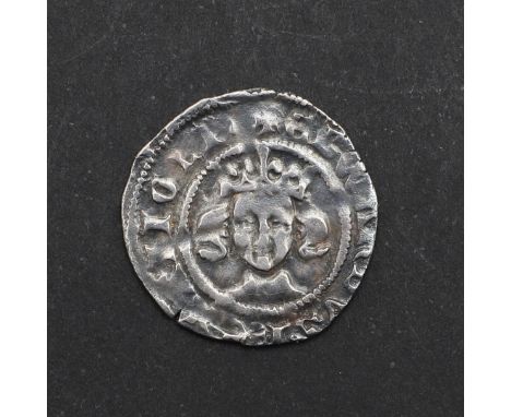 An Edward III long cross penny, facing crowned portrait, reverse with quatrefoil to the center of the cross, York mint, 1.19g