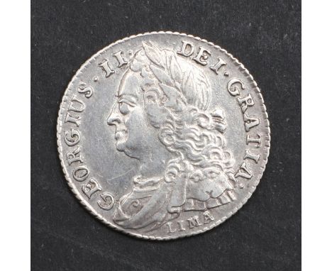 A George II sixpence, old laureate and draped bust l. with Lima below, the reverse with plain angles and dated 1745. *CR A ni