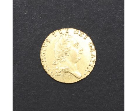 A George III Half Guinea, fifth laureate head r. reverse with 's pade' shaped shield and dated 1787. c. 4.16g. *CR A nice cri