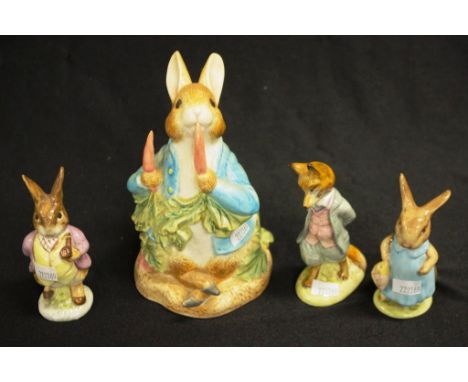 Three Beswick Beatrix Potter figurines comprising Mr Benjamin Bunny, Mrs Flopsy Bunny, and Foxy whiskered gentleman, together