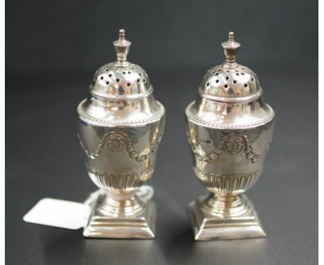 Pair of Victorian sterling silver pepper pots hallmarked Sheffield 1890 (Henry Wilkinson & Co), 9cm high, 86 grams approx, wi