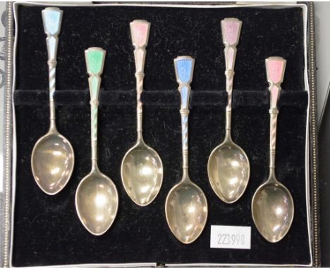 Cased set six ER2 enamel silver gilt coffee spoons hallmarked for Birmingham 1957, makers Turner and Simpson, each of silver 