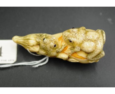 Japanese carved resting frogs netsuke signature to base, 7cm length approx.