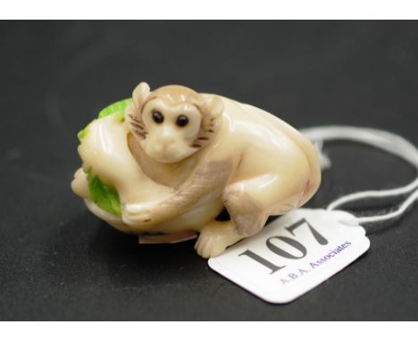Japanese carved thieving monkey netsuke signature to monkey's left cheek, 5cm length approx.