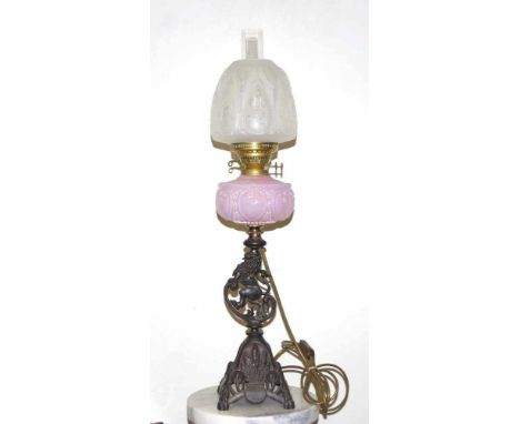 Antique kerosene banquet lamp converted to electricity, 81cm high approx, a similar lamp is illustrated on the front cover of