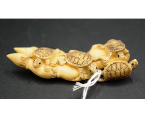 Japanese basking turtles carved netsuke signature to base, 9.5cm length approx.
