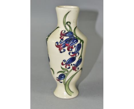 A MOORCROFT POTTERY BLUEBELL HARMONY VASE, the footed vase decorated in the Bluebell Harmony pattern, designed by Kerry Goodw